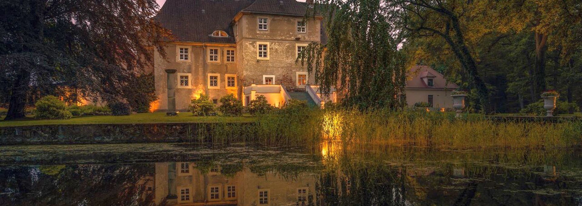 Wasserschloss Mellenthin in der Dämmerung, © Wasserschloss Mellenthin