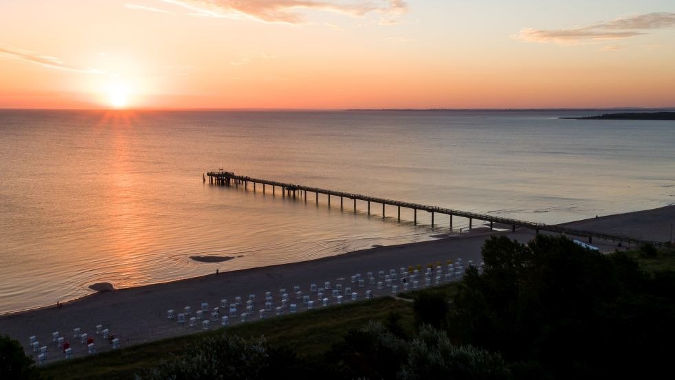 Blick auf den Boltenhagener Strand und die Seebrücke im Sonnenuntergang, © VMO/Moritz Kertzscher