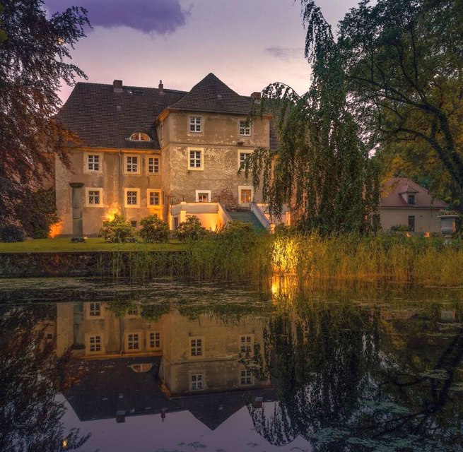 Wasserschloss Mellenthin in der Dämmerung, © Wasserschloss Mellenthin