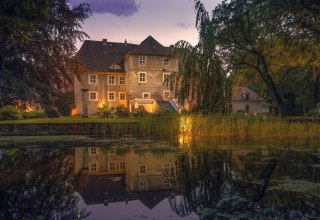 Wasserschloss Mellenthin in der Dämmerung, © Wasserschloss Mellenthin